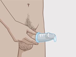 Hold på kondomet ved penisroten så du er sikker på at det ikke renner ut sæd.