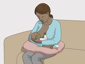 Wijzen van soa-besmetting: moeder geeft haar baby borstvoeding.